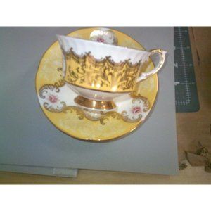 RARE PARAGON TRENTON YELLOW/GOLD FLORAL TEACUP AND SAUCER SET